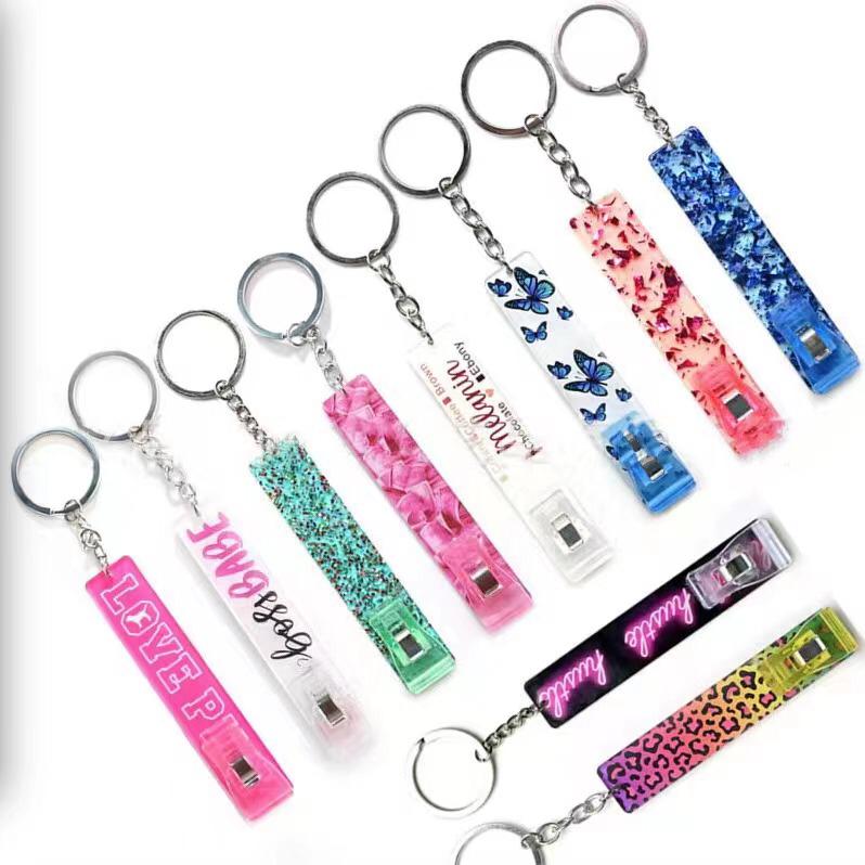 10 acrylic card grabbers in beautiful designs. all ten attach to key chains